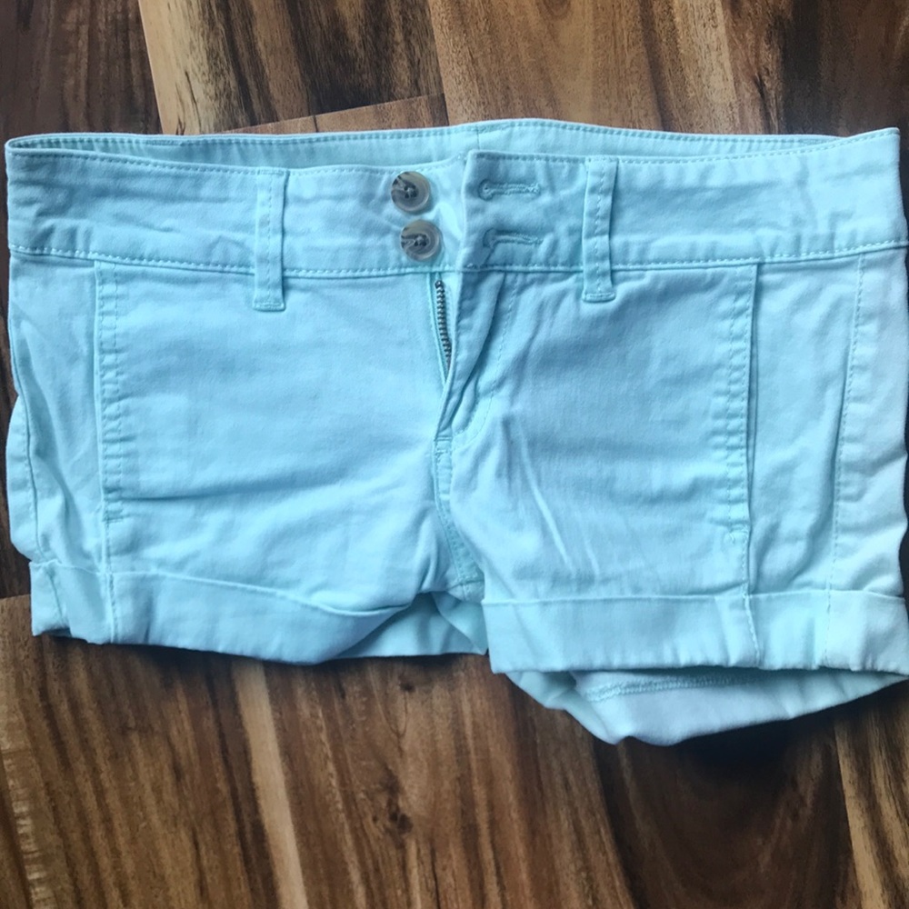 Mint green cuffed shorts